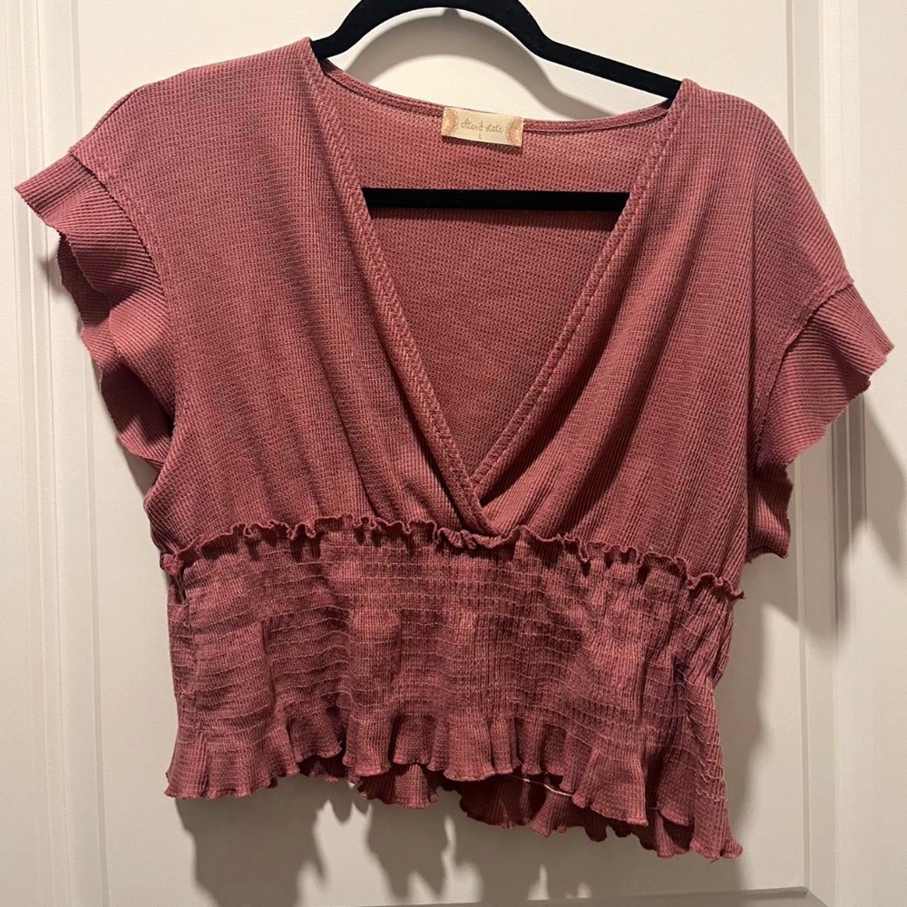 Dark pink/purple ruffle top from Altar'd State